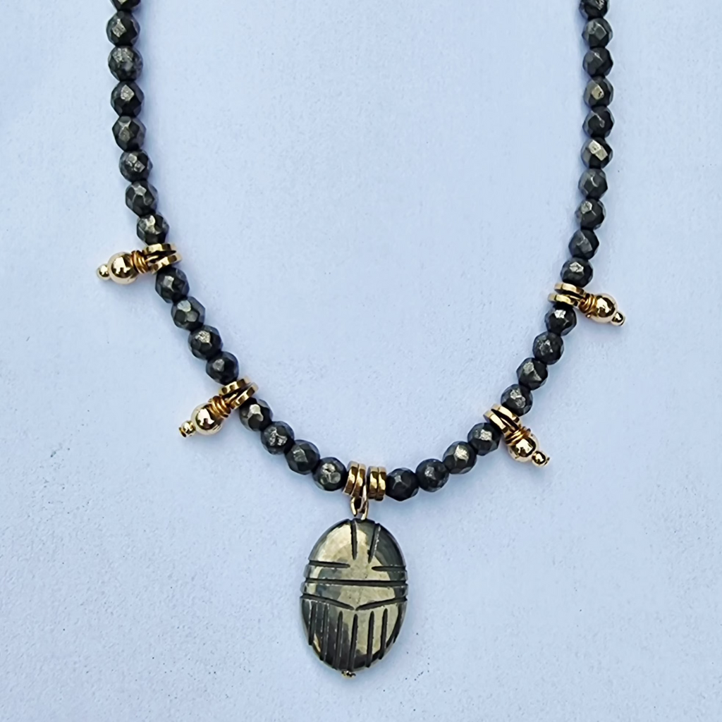 collier " Scarabée d'Or " https://www.b-tao.be/